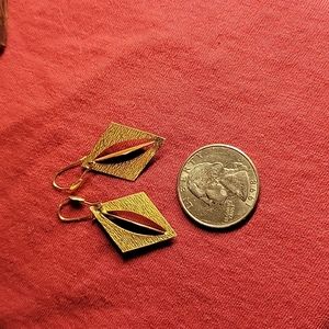 Stamped 14k dangle pierced earrings.